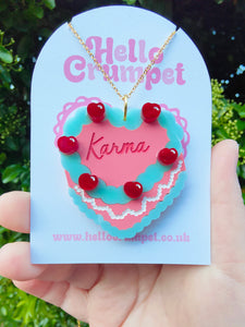 Karma cake necklace