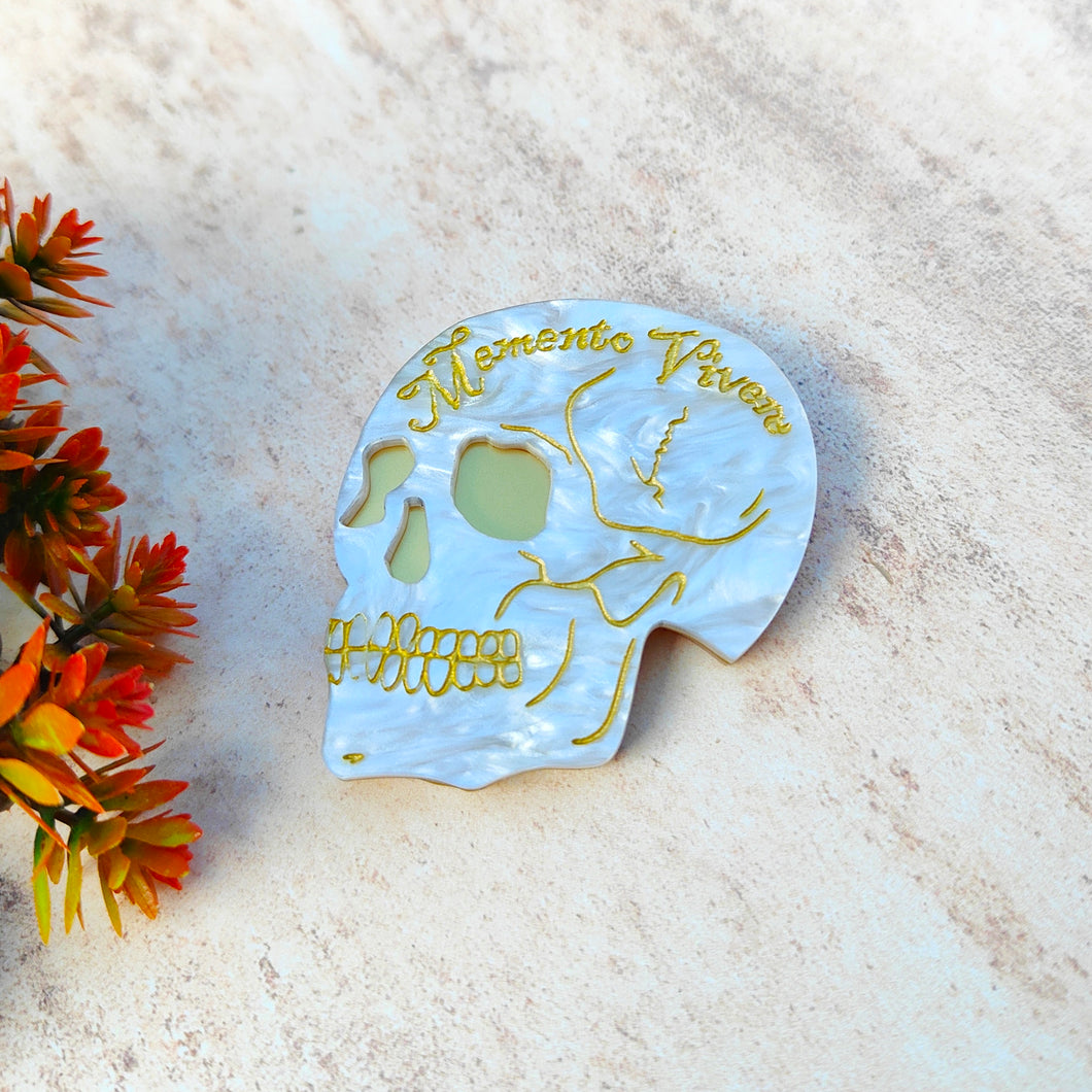 'Memento Vivere' skull brooch