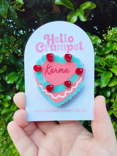 Karma cake brooch