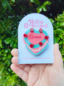Karma cake brooch